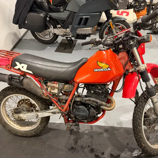 As purchased, right side. Rear rack, XL seat, the original graphics still on the tank. It looked better from here than it did up close.