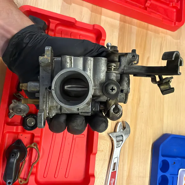 Secondary carb on its own. The long arm on the right is the linkage that the primary drives.