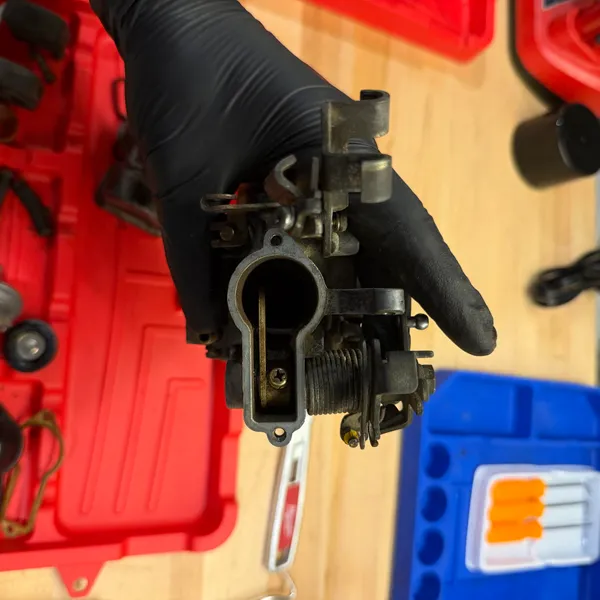 Throttle shaft and butterfly, secondary carb. The shaft turns freely, which was a relief.