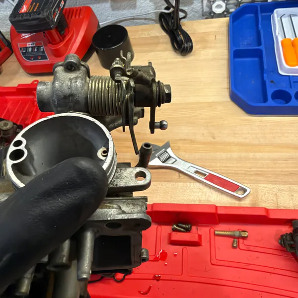 Vacuum slide and spring out of the secondary. The diaphragm is the part to inspect carefully here.