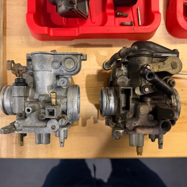 Primary (left) and secondary (right) side by side on the bench, before the morning's work. Manual page 4-9 in the corner.