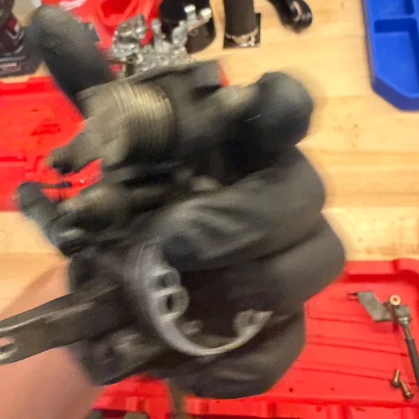 Same part, blurry because I was trying to hold it, the phone, and a screwdriver. Kept for the angle.