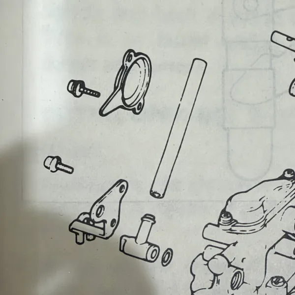 Shop manual, carburetor exploded view. The linkage and the choke lever side.