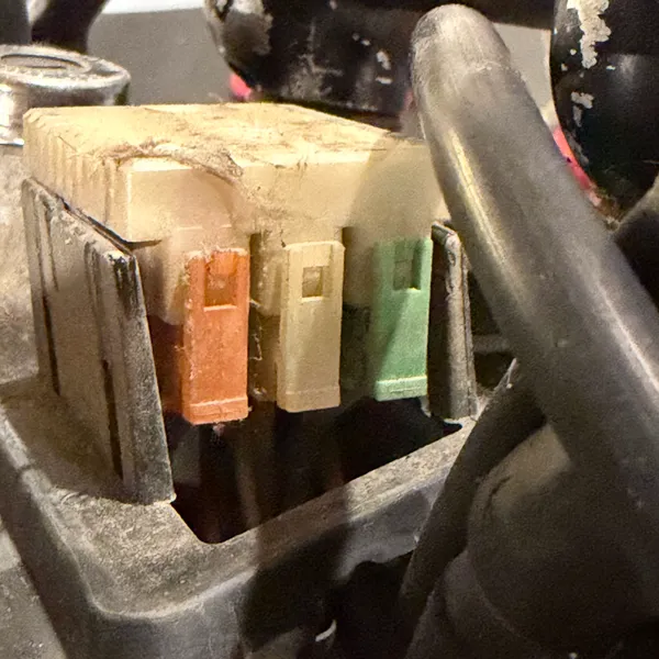 Connector block from the other side. The orange, cream and green wires are the ones to note before unplugging.