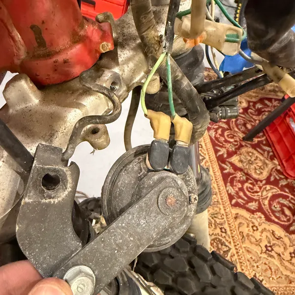 Horn and its bracket off the bike.